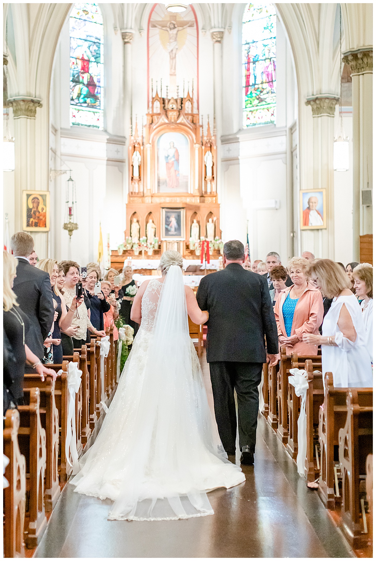 father walking bride down the aisle at St. Agatha's Catholic Church