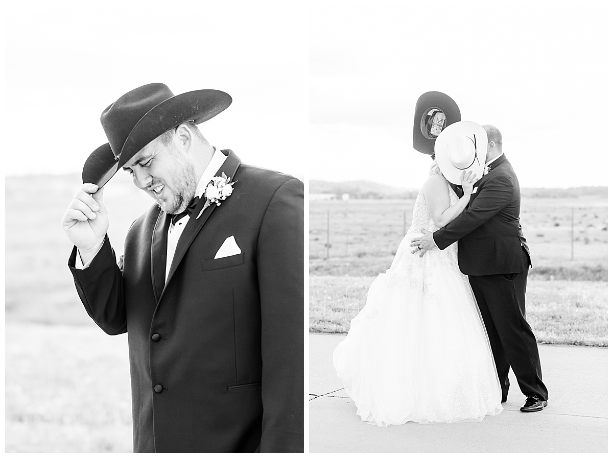 groom wearing cowboy hat kissing bride