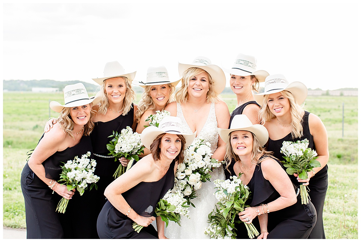 bridesmaids wearing cowboy hats