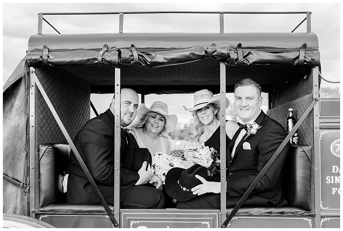 bride and groom in stagecoach 