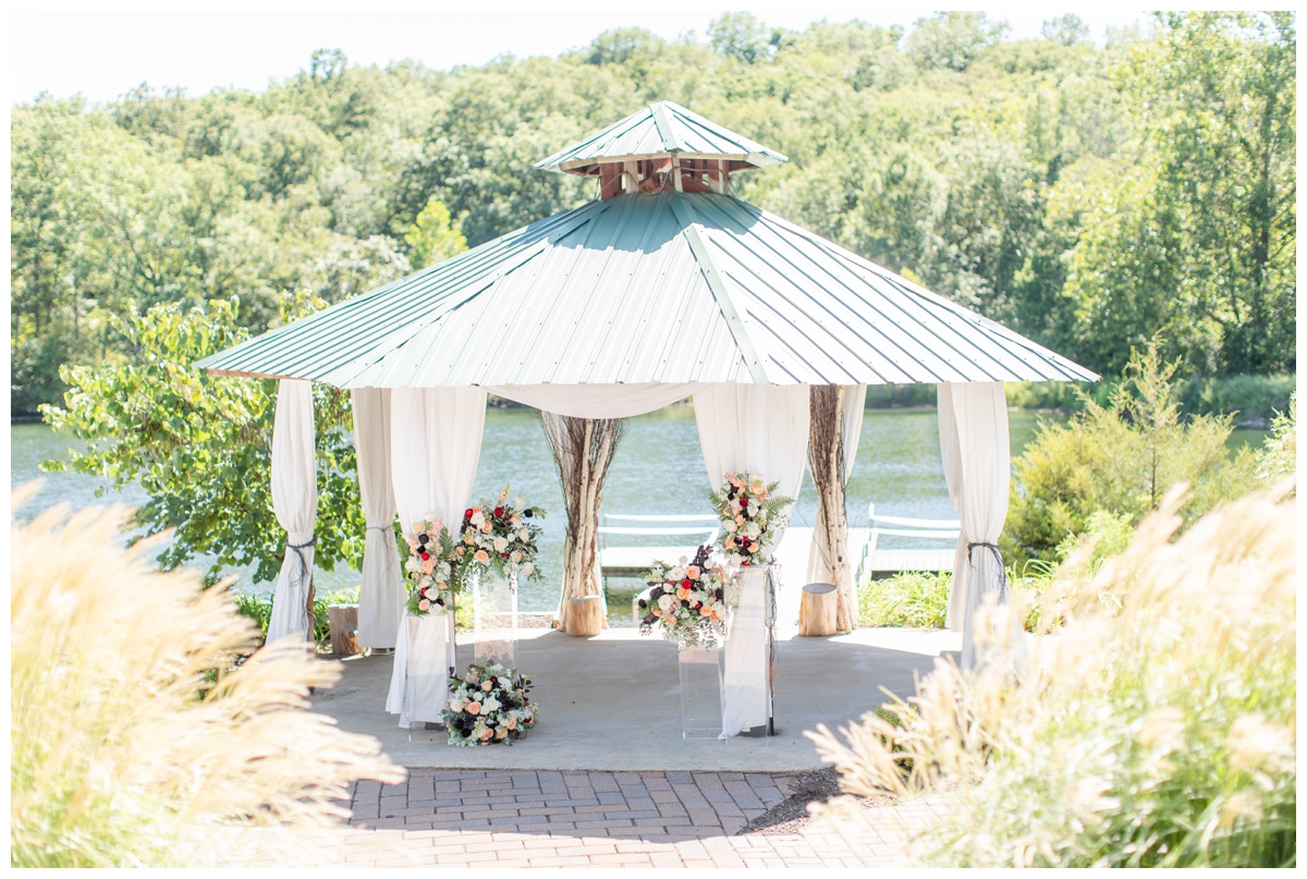 Ceremony by the lake at Little Piney Lodge