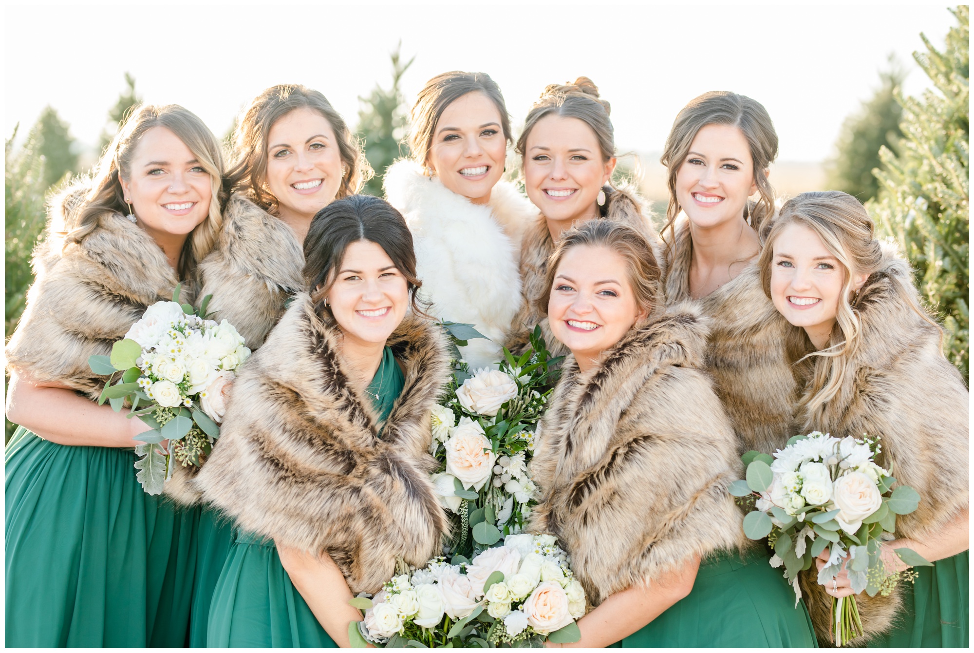 Greenhouse winter wedding bridesmaids wearing fur