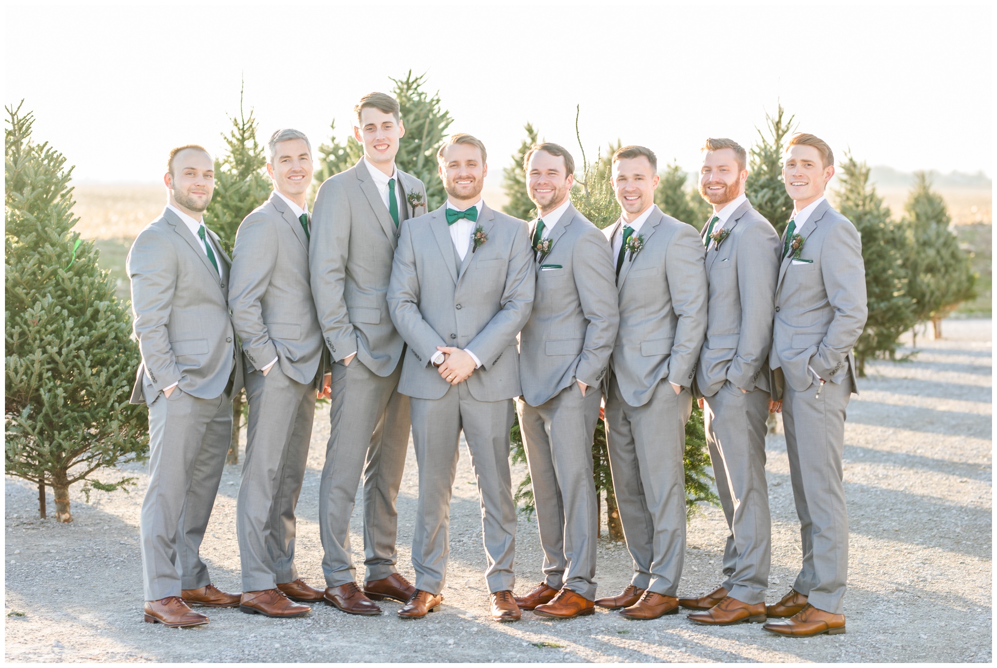 Greenhouse winter wedding groomsmen in grey