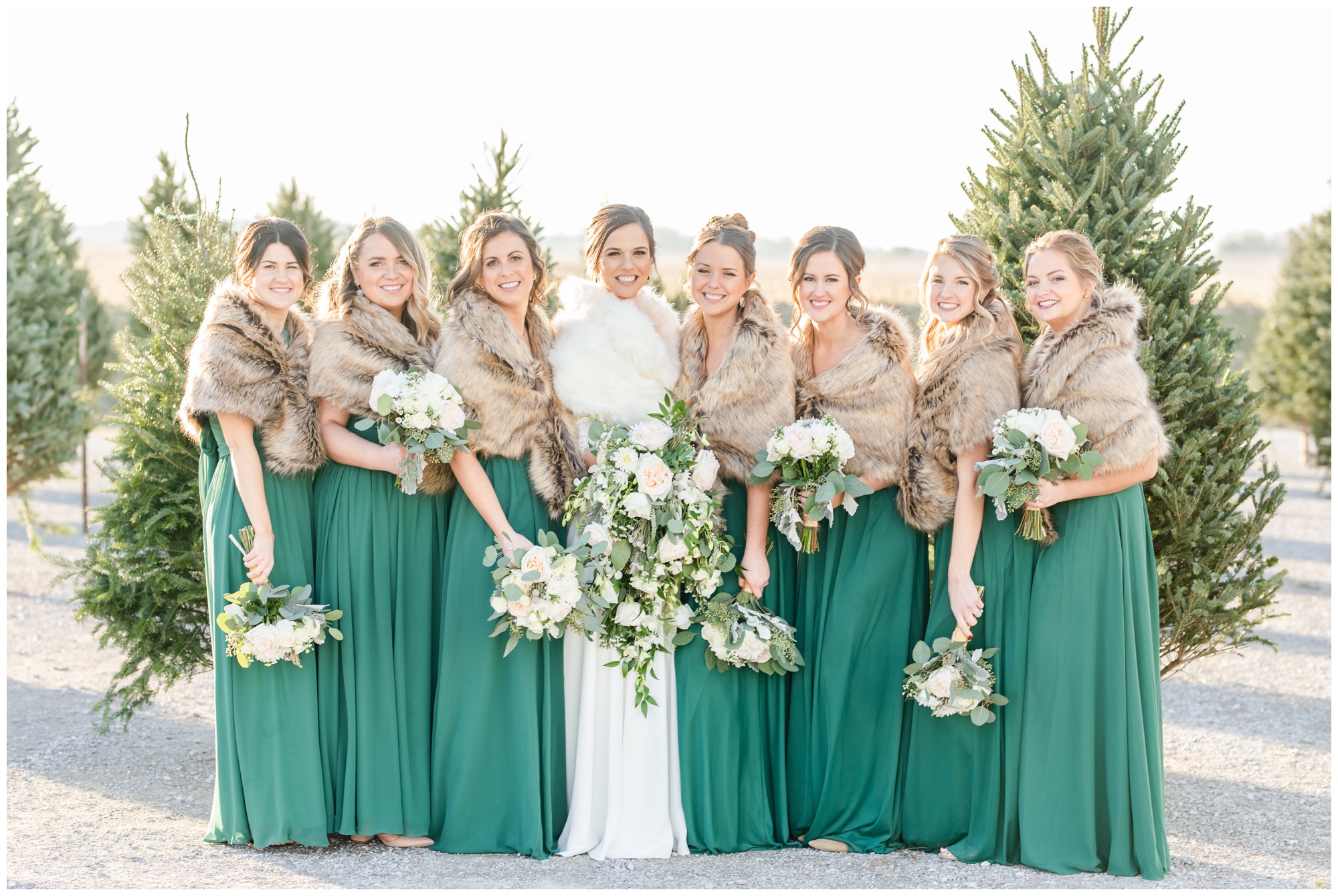 Greenhouse winter wedding bridesmaids in green