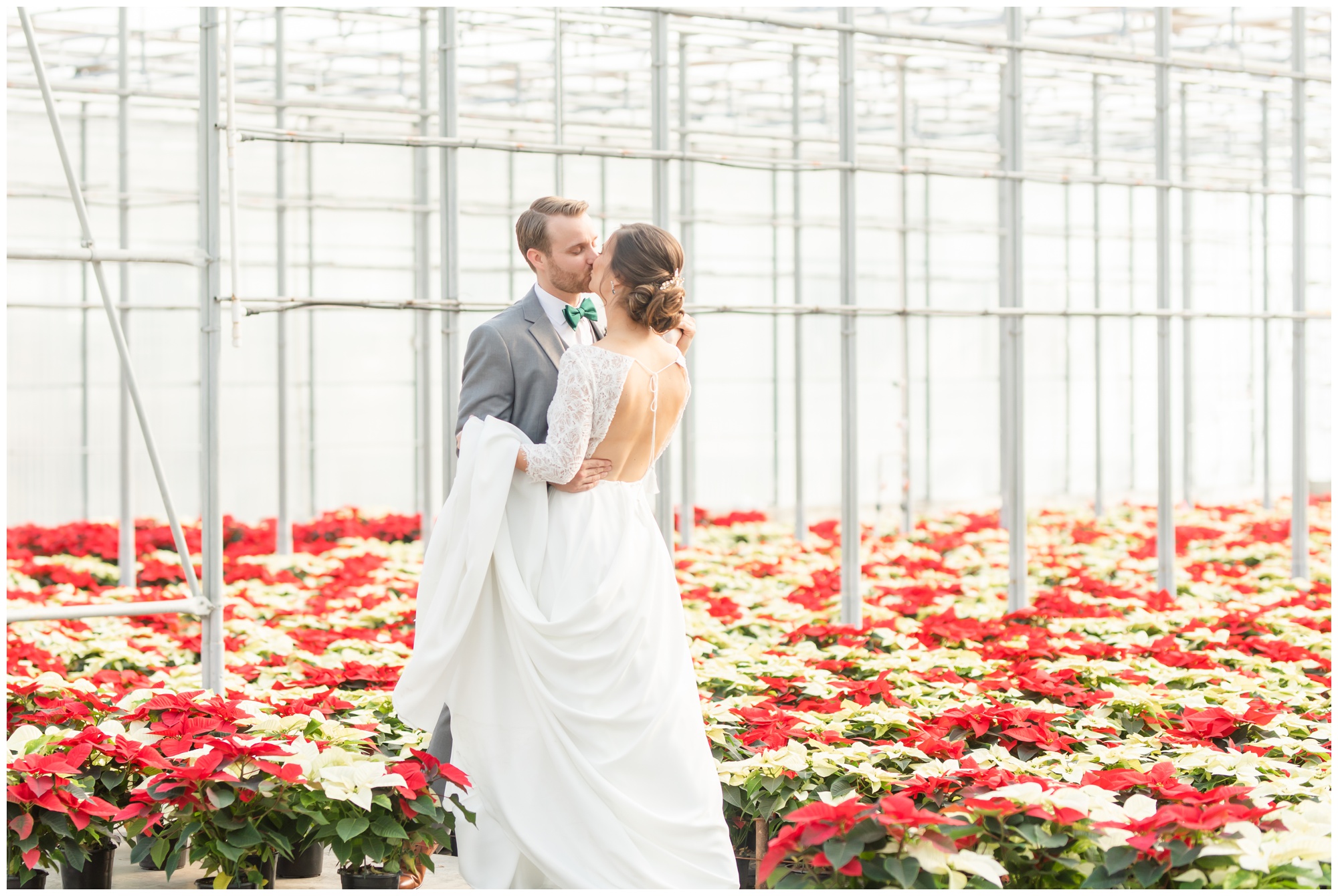Greenhouse winter wedding bride and room kissing