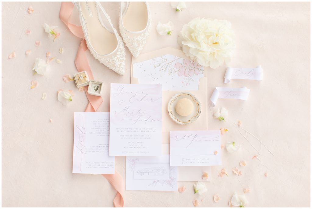 soft pink and peach wedding invitation with Bella belle shoes at Emerson Fields Wedding Venue