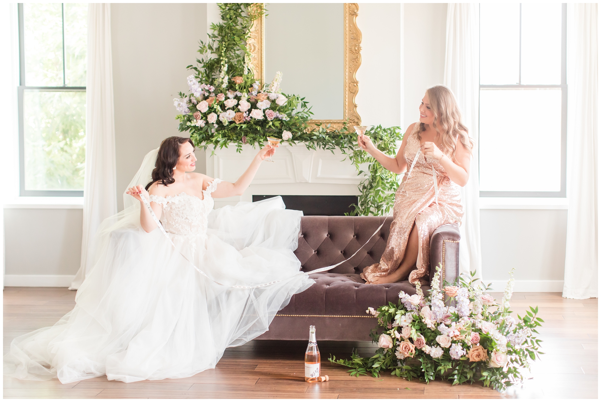 bride and bridesmaid on couch