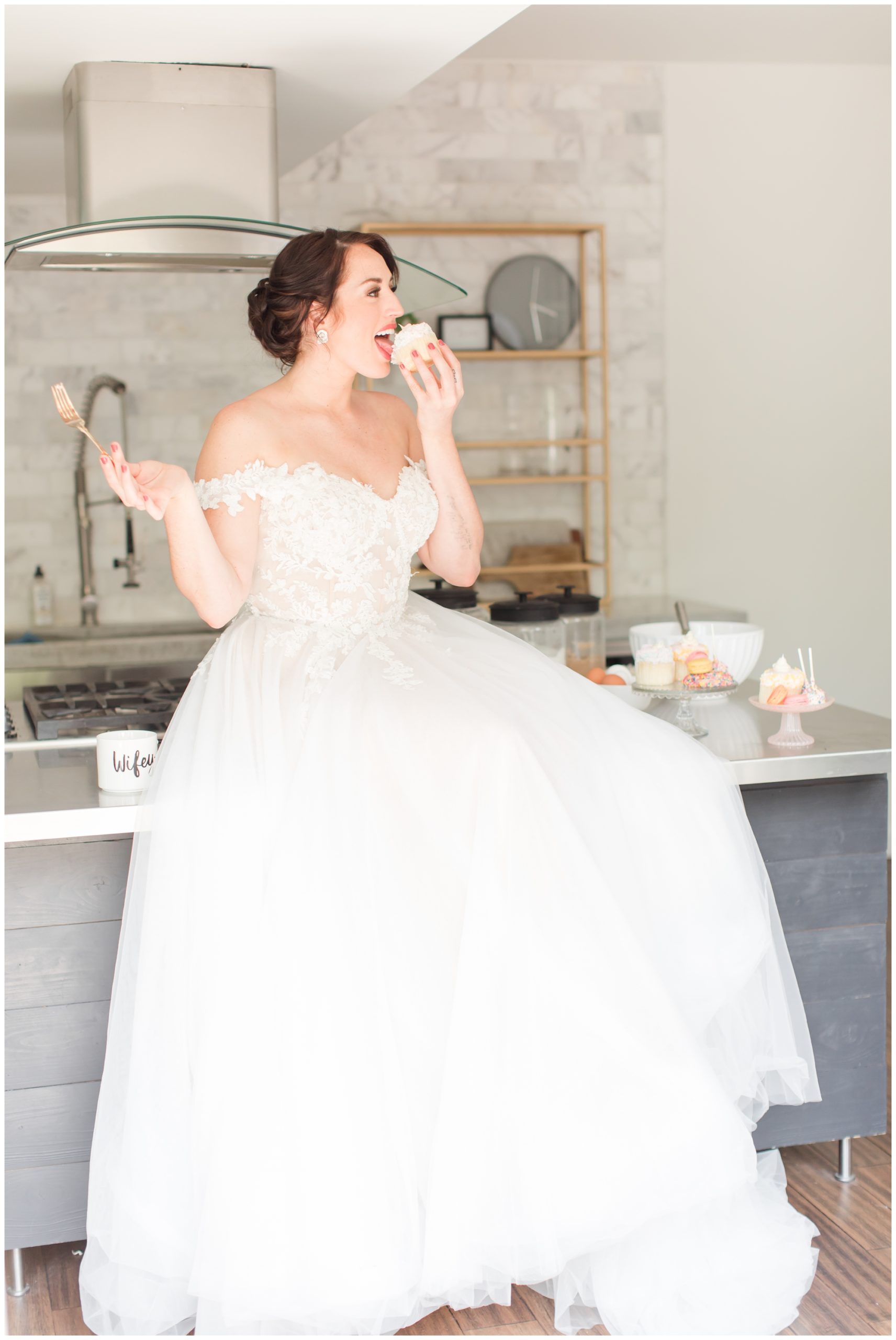 Bride eating wedding cake