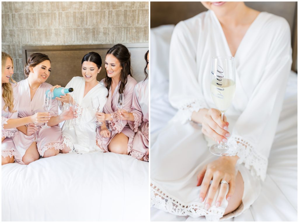 1st pic: The bride laughs with her attendants in matching robes while they pour champagne from a bright turquoise bottle. 2nd pic: The bride holds a custom champagne glass. 