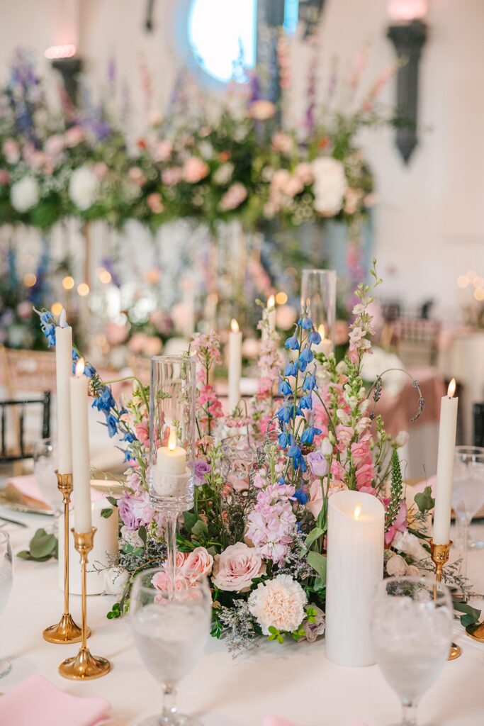 lush wedding tablescape, pastel blooms, candlesticks, Bridgerton tablescape inspiration