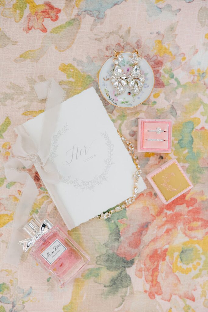 bridal detail shot, bride accessories flatlay, Miss Dior wedding perfume, her vows bride book